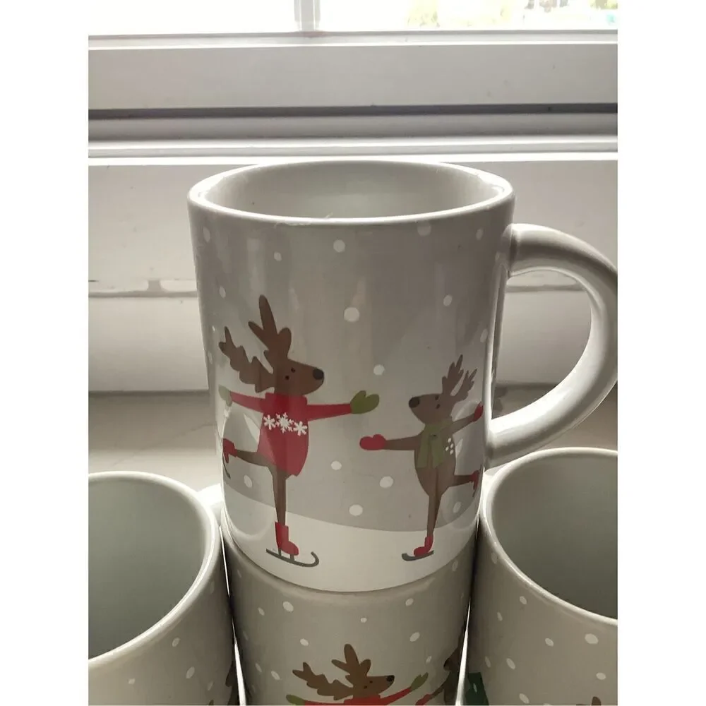 Set of 4 Crate & Barrel 12oz Ceramic Coffee Mugs Joan Anderson Skating Reindeer